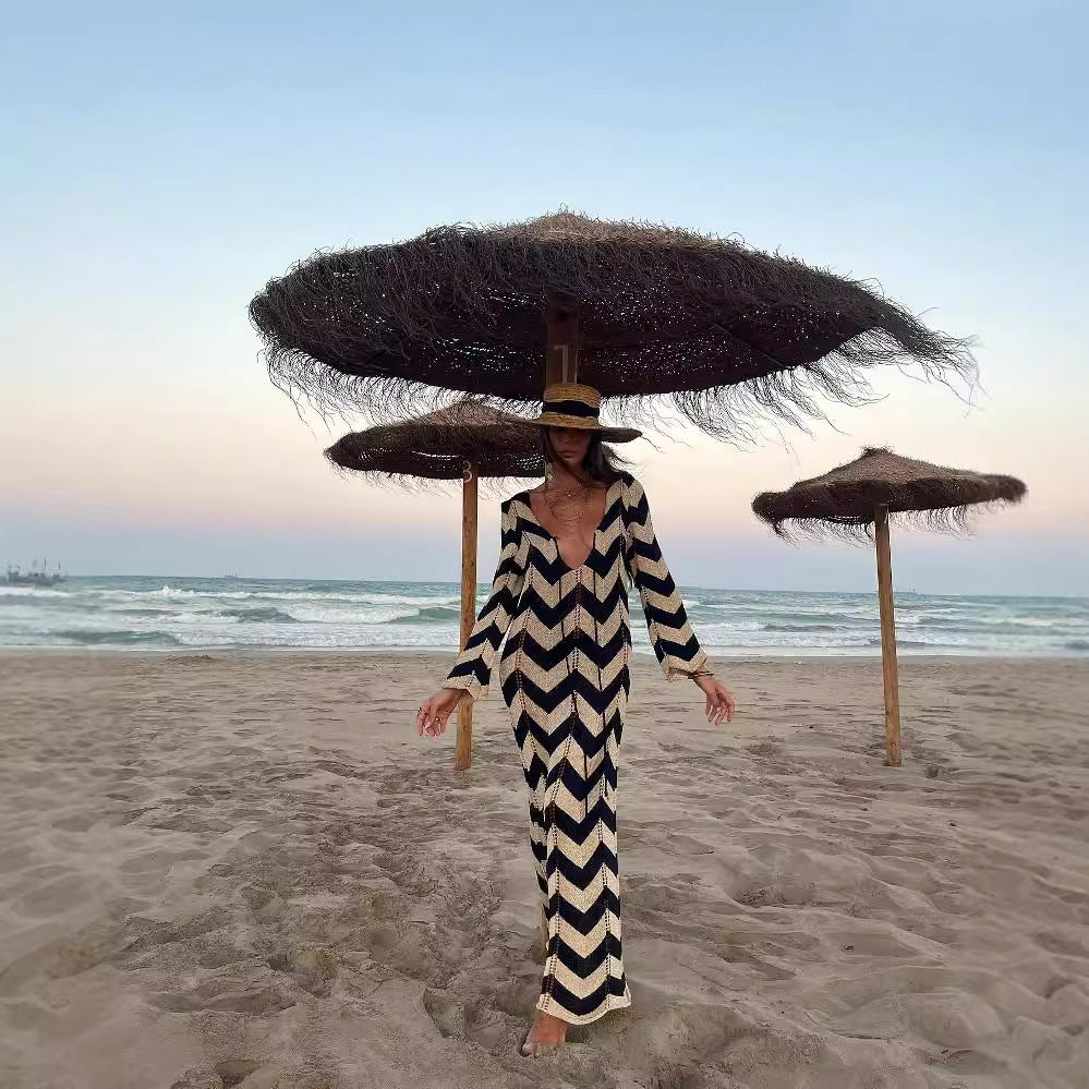 Women's knitted dress with a modern zigzag pattern and deep V-neck, size [size missing]