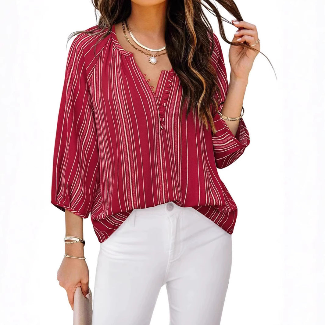 Women's elegant tunic blouse with sophisticated stripes, size
