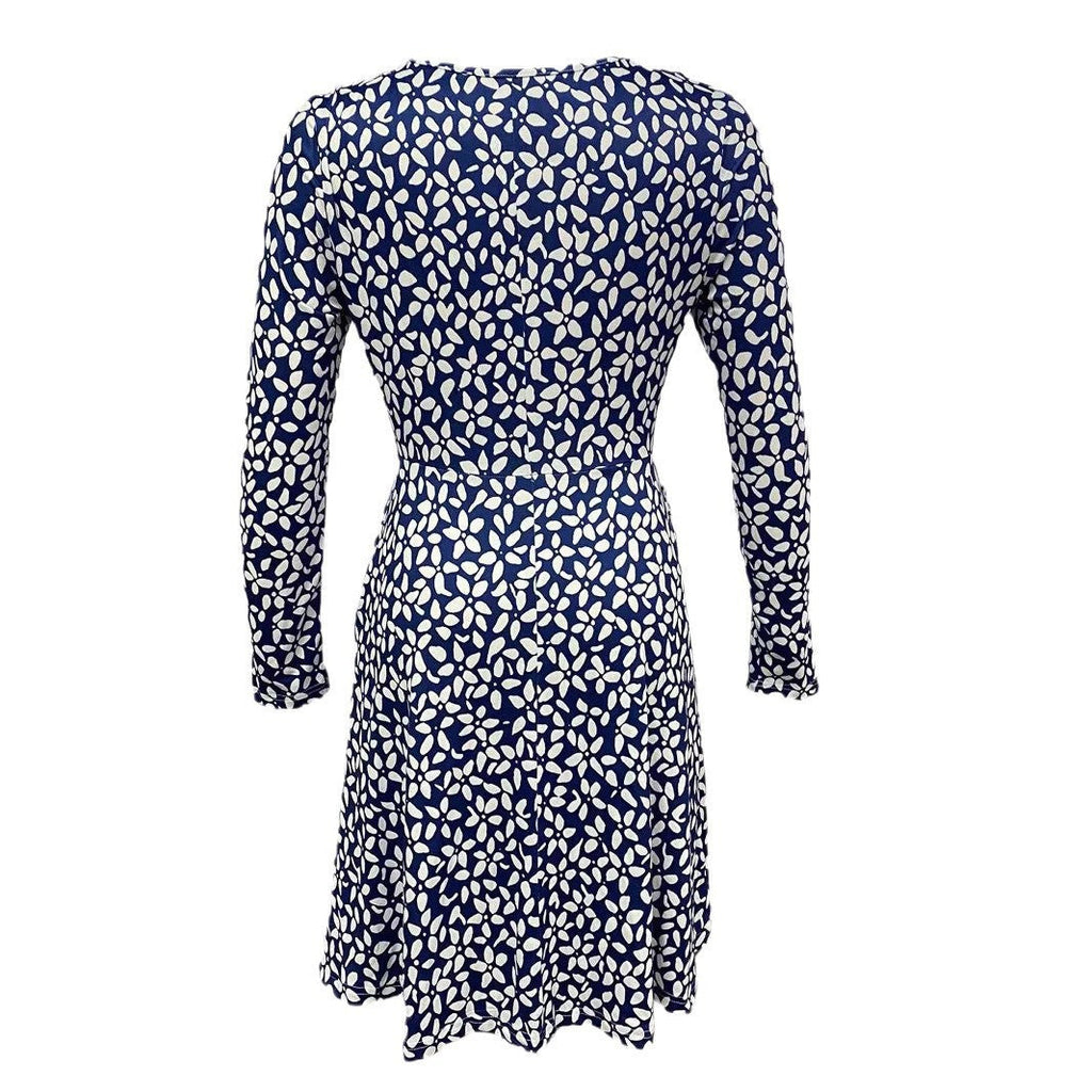 Women's blouse dress with floral design and practical pockets, size