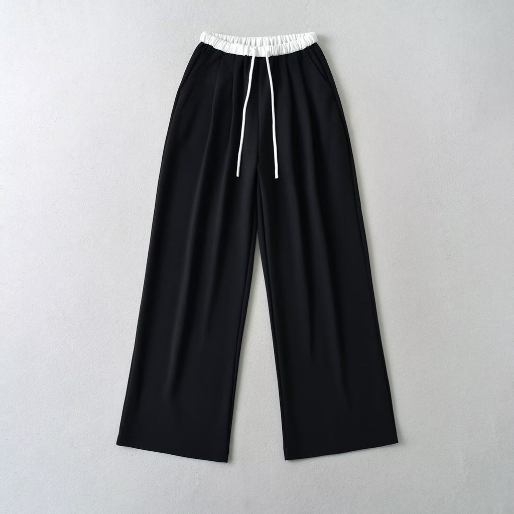 Women's comfortable sweatpants with elastic waistband and side pockets, size