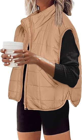 Women's quilted vest with high collar and practical side pockets, size