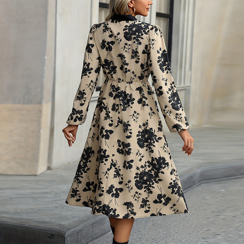 Women's elegant midi dress with floral pattern and bow details, size