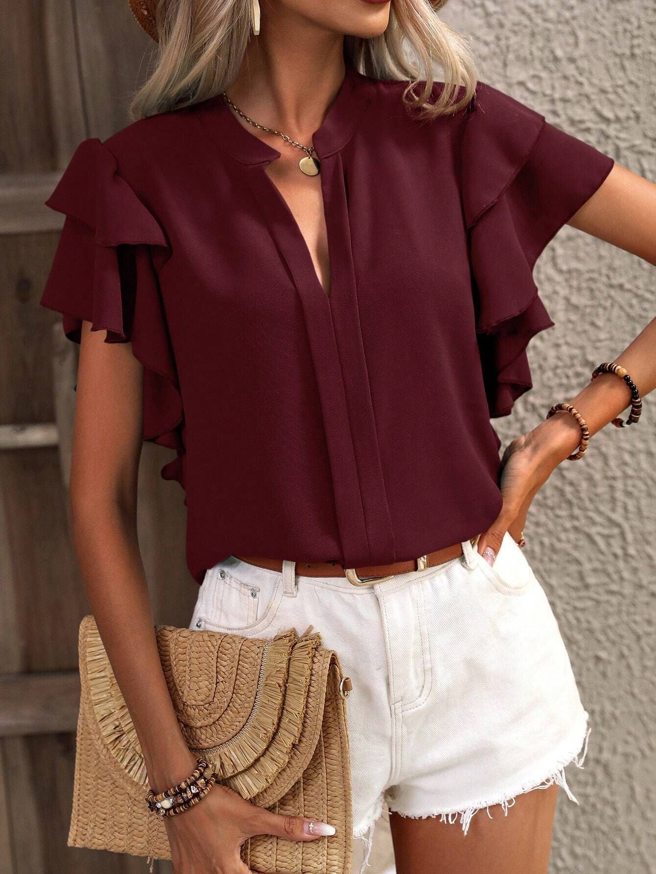 Women's blouse with decorative ruffle details and elegant V-neck, size [size missing]