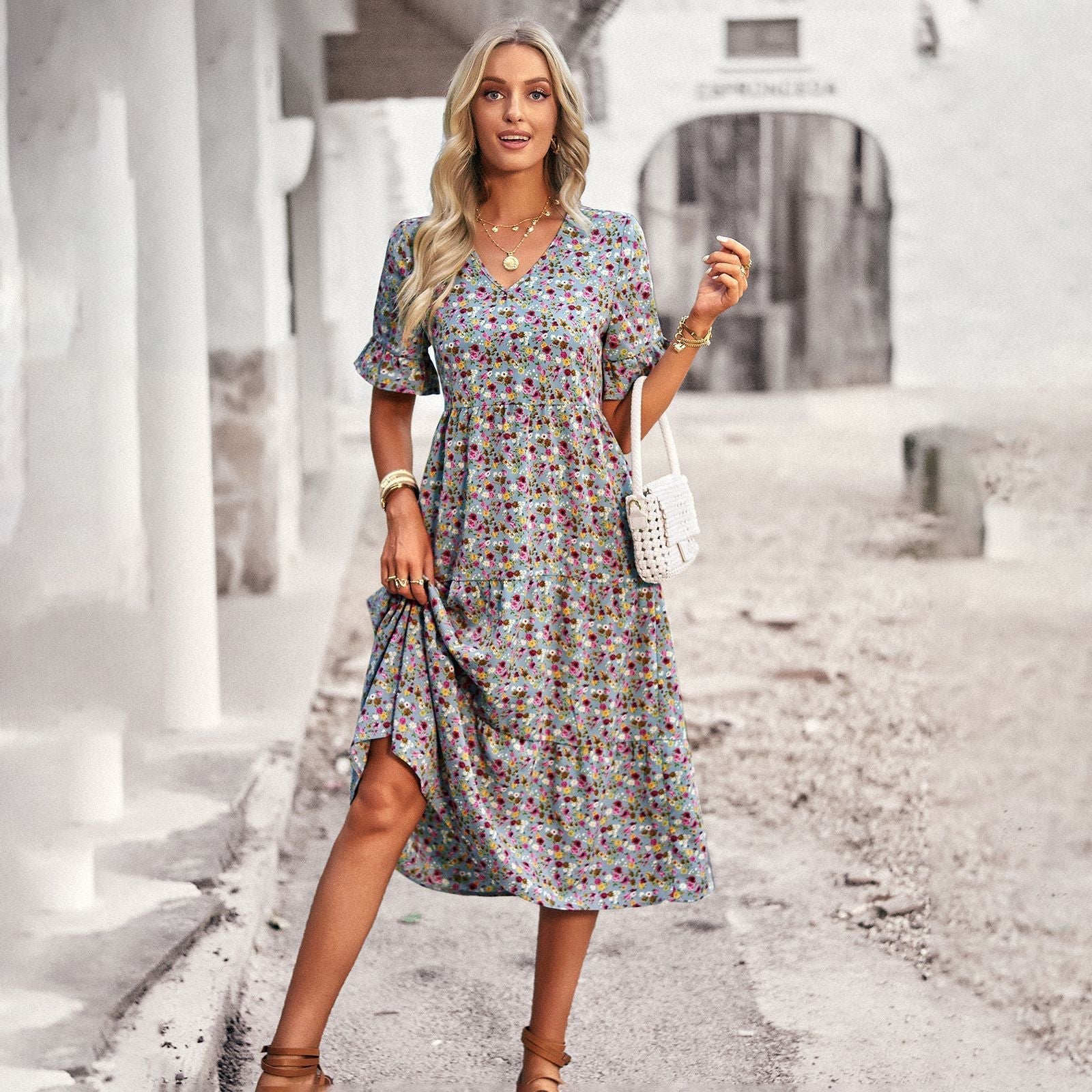Women's midi dress with floral pattern and playful V-neck, size