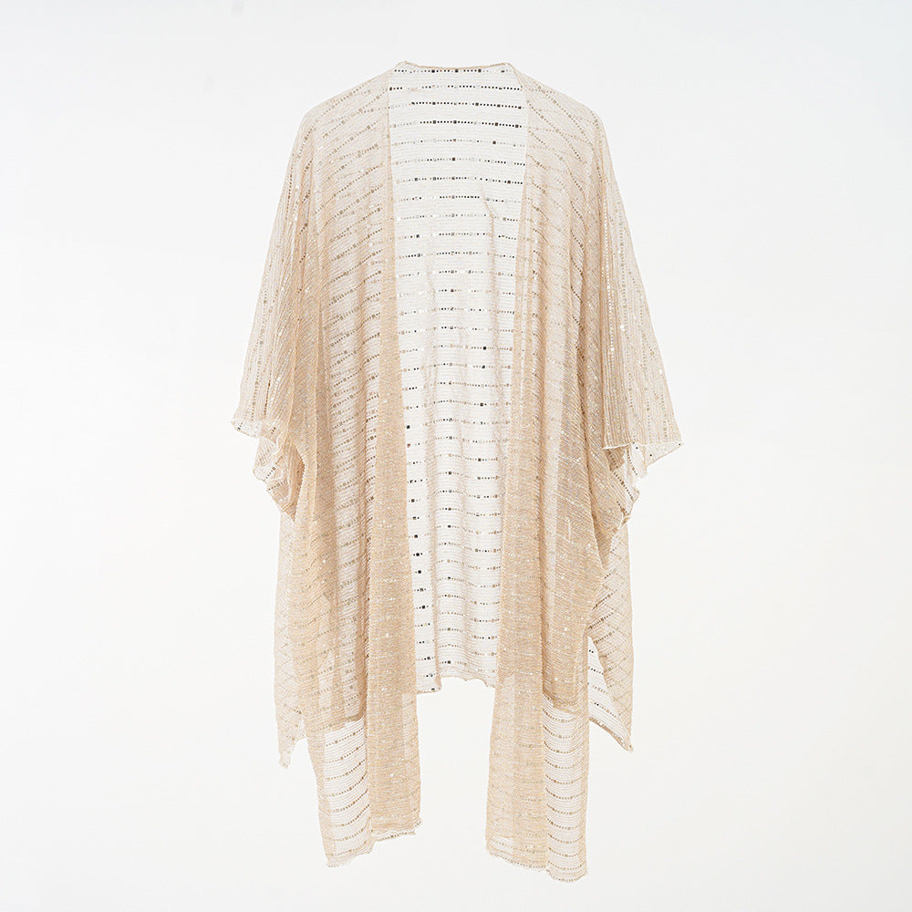 Women's elegant kaftan wrap with a fine crocheted design and asymmetrical edges, size GR