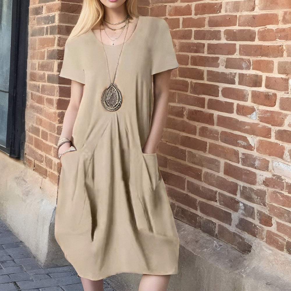 Women's casual short-sleeved dress with side pockets and a relaxed fit, size S