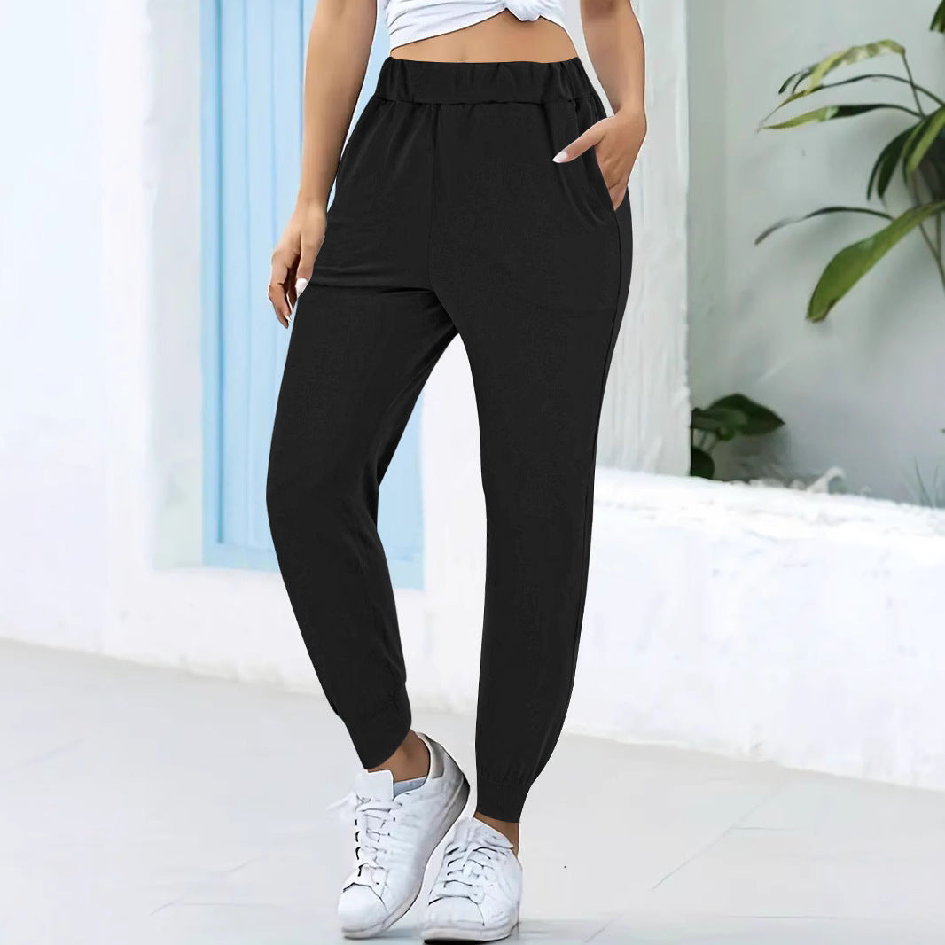 Women's comfortable jogging pants with elastic waistband and practical side pockets, size