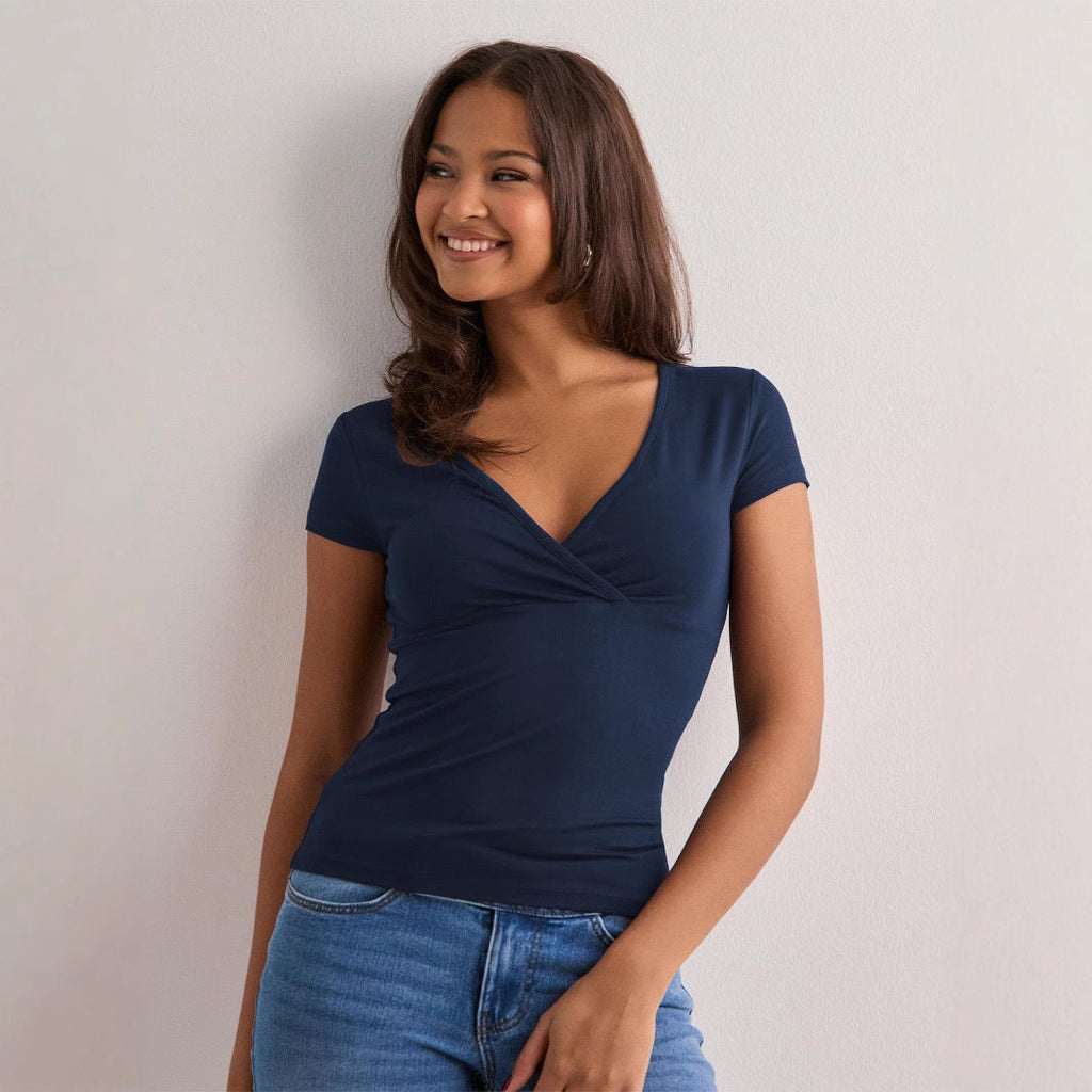 Women's wrap top with elegant ruching and figure-hugging cut, size S