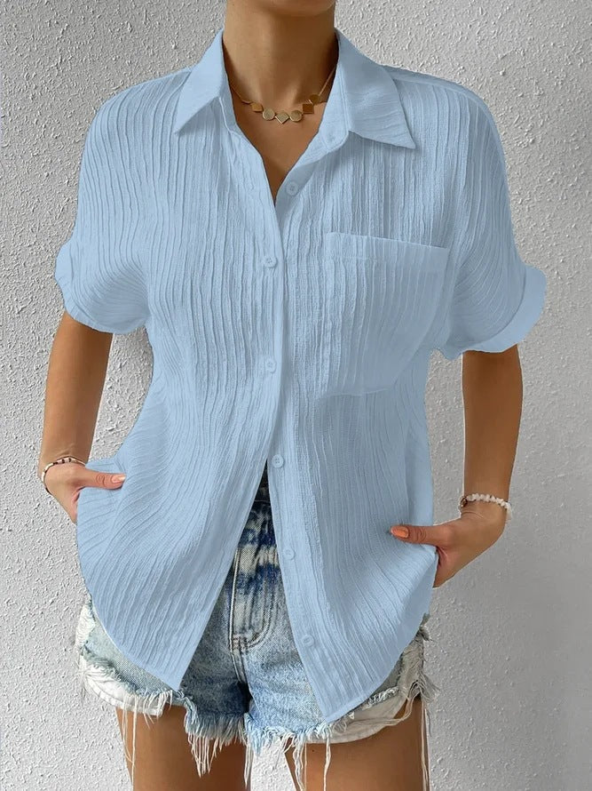 Women's short-sleeved shirt blouse with textured outer material, size S