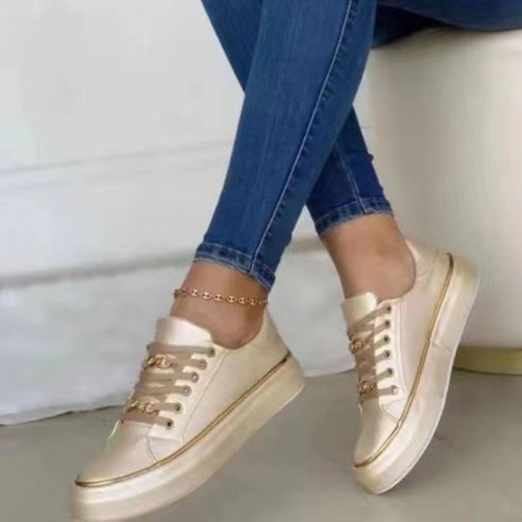 Women's sneakers with a fashionable satin upper and elegant gold accents, size GR