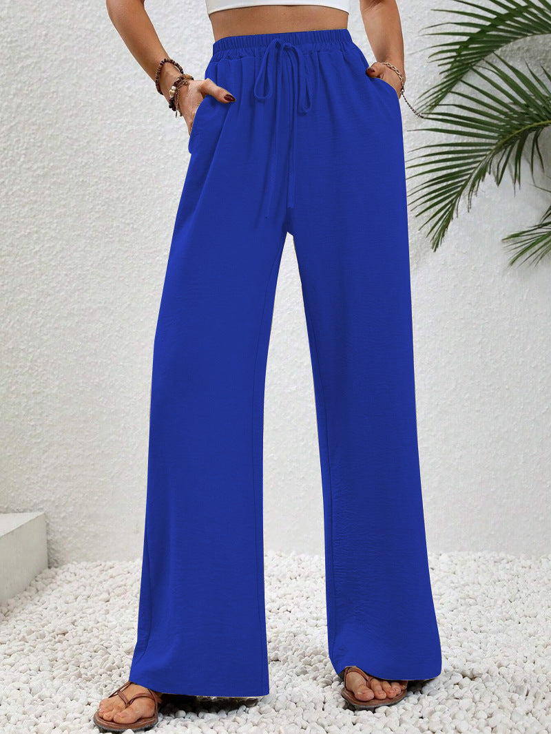 Women's casual, wide-legged leisure trousers with elasticated waistband and side pockets, size S