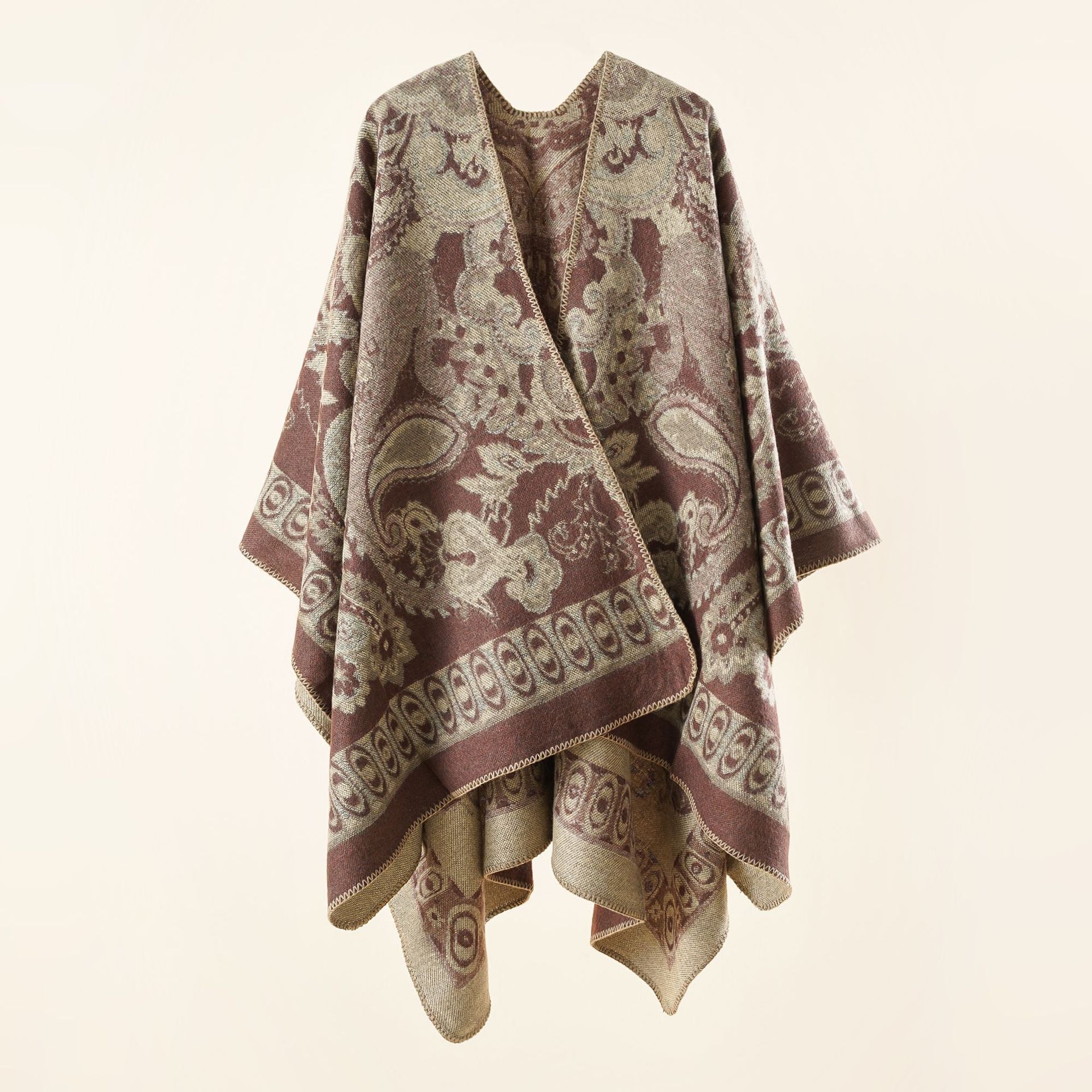 Women's elegant poncho with an artistic floral pattern and luxurious feel (size not specified)
