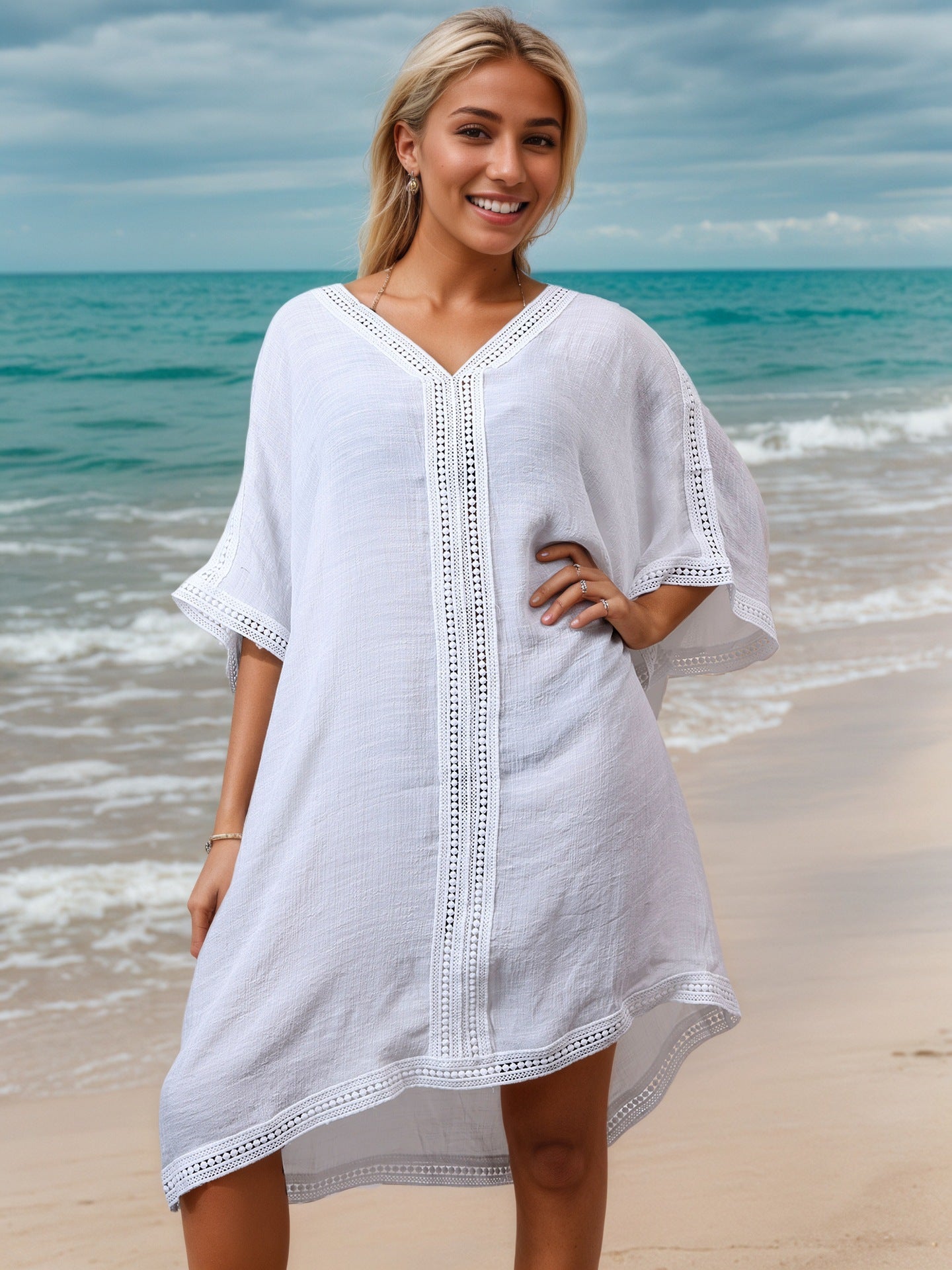 Damen Strandkleid mit dekorativen Häkel-Details und asymmetrischem Saum GR