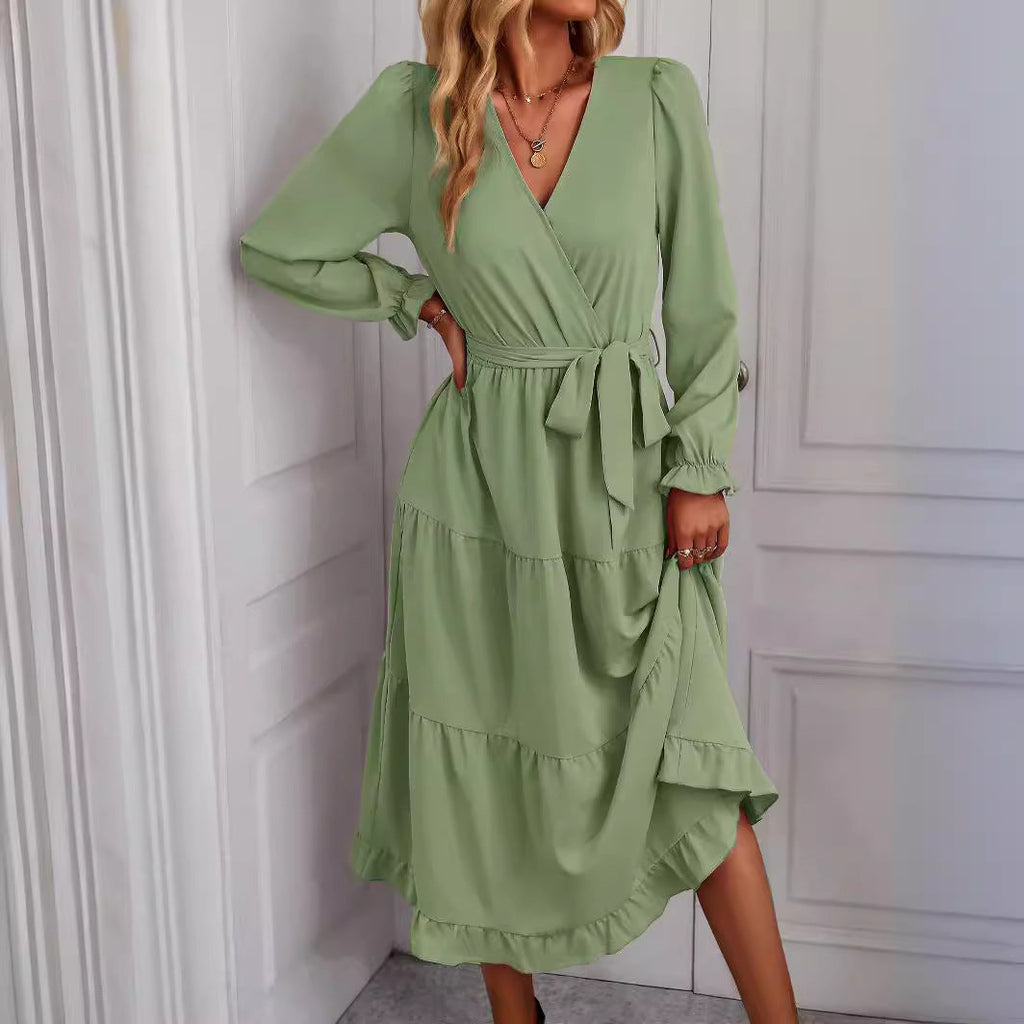 Women's wrap dress with ruffles and waist belt, size