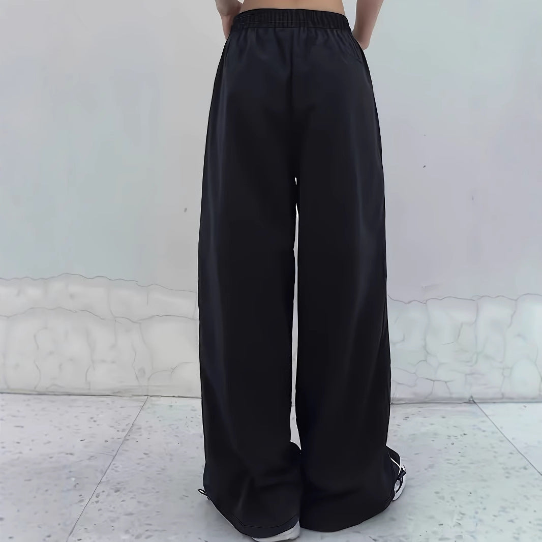Women's sporty wide-leg trousers with side stripes and elasticated waistband, size
