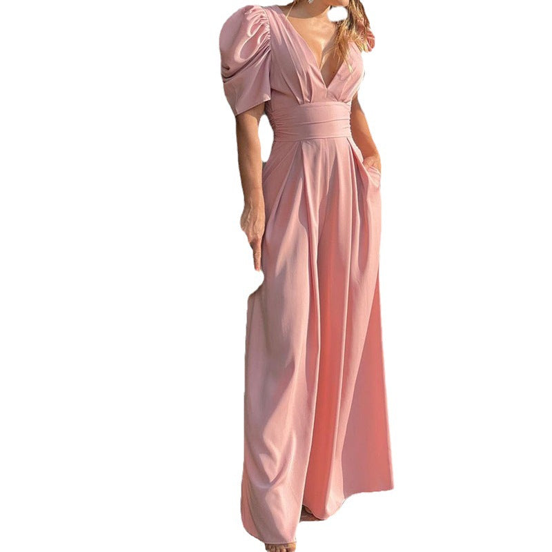 Women's elegant jumpsuit with voluminous puff sleeves and deep V-neck, size [size]