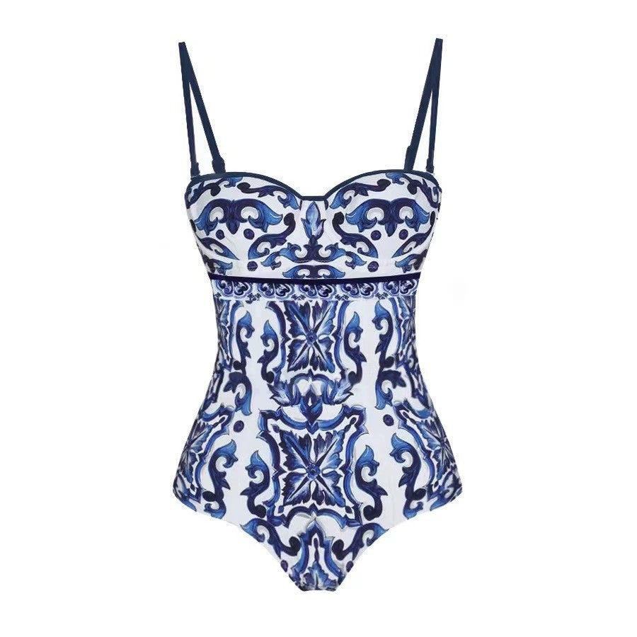 Women's swimsuit set with elegant wrap skirt look and charming motif, size S