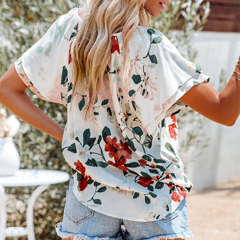 Damen luftige Bluse mit floralem Muster und dekorativen Knopfdetails GR