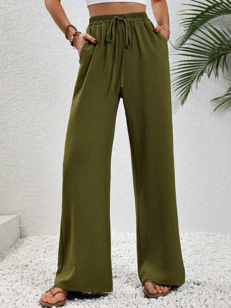 Women's casual, wide-legged leisure trousers with elasticated waistband and side pockets, size S