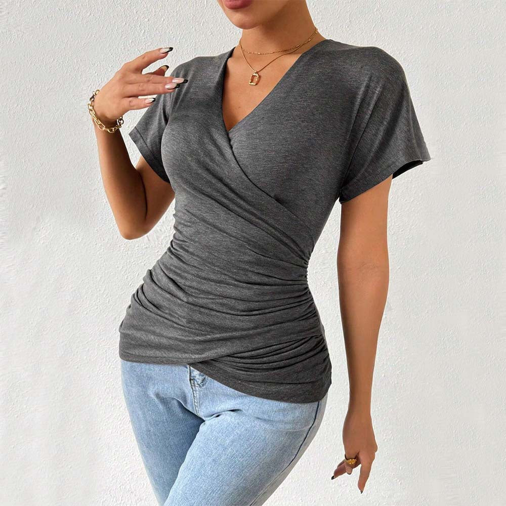 Women's wrap top with sophisticated ruching details, size S