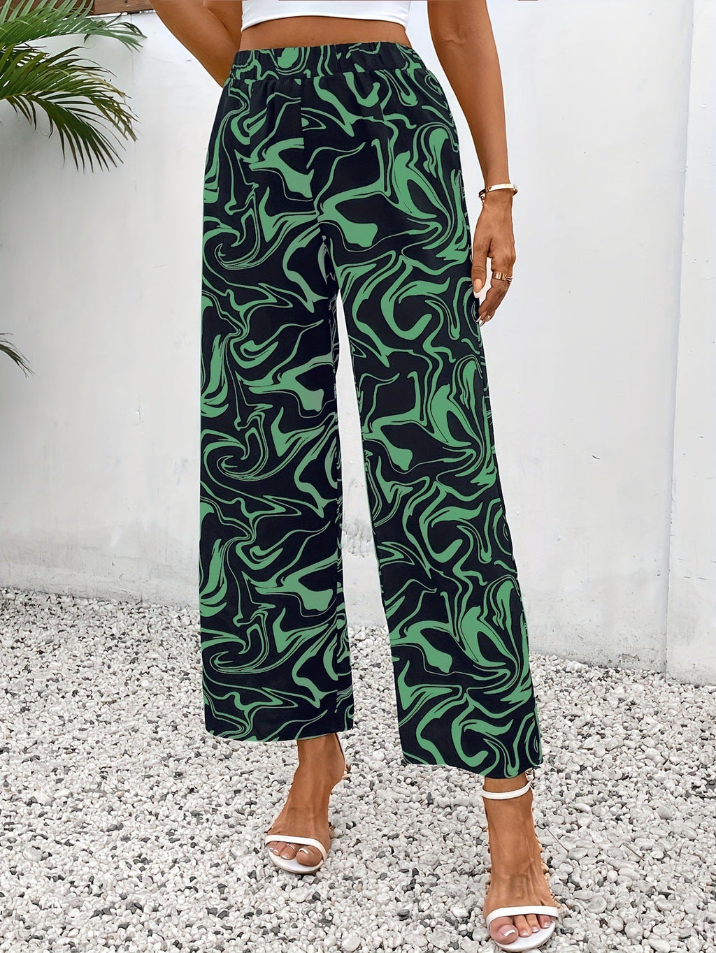 Women's wide-leg palazzo trousers with a modern marble print and elasticated waistband, size S