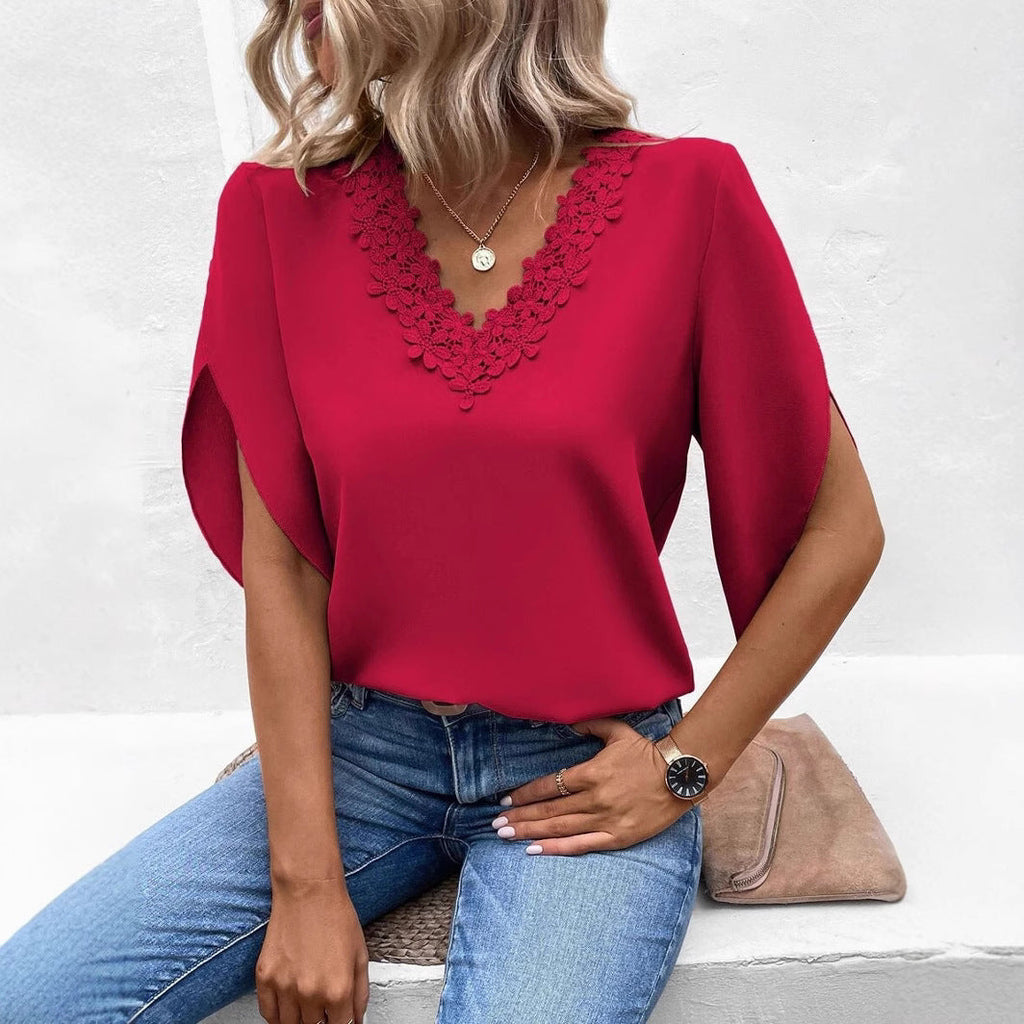 Women's blouse with floral lace appliqués and elegant cut-out sleeves, size S