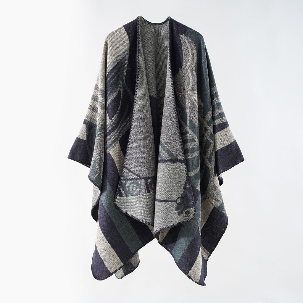 Women's elegant knitted poncho with artistic pattern and fine fringe, size GR