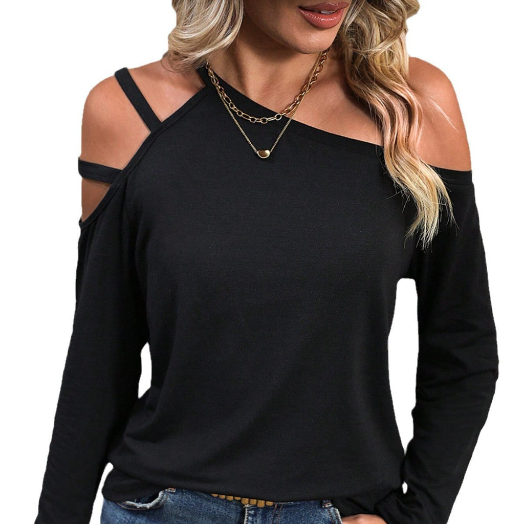 Women's top with asymmetrical cut-out and fashionable strap details, size