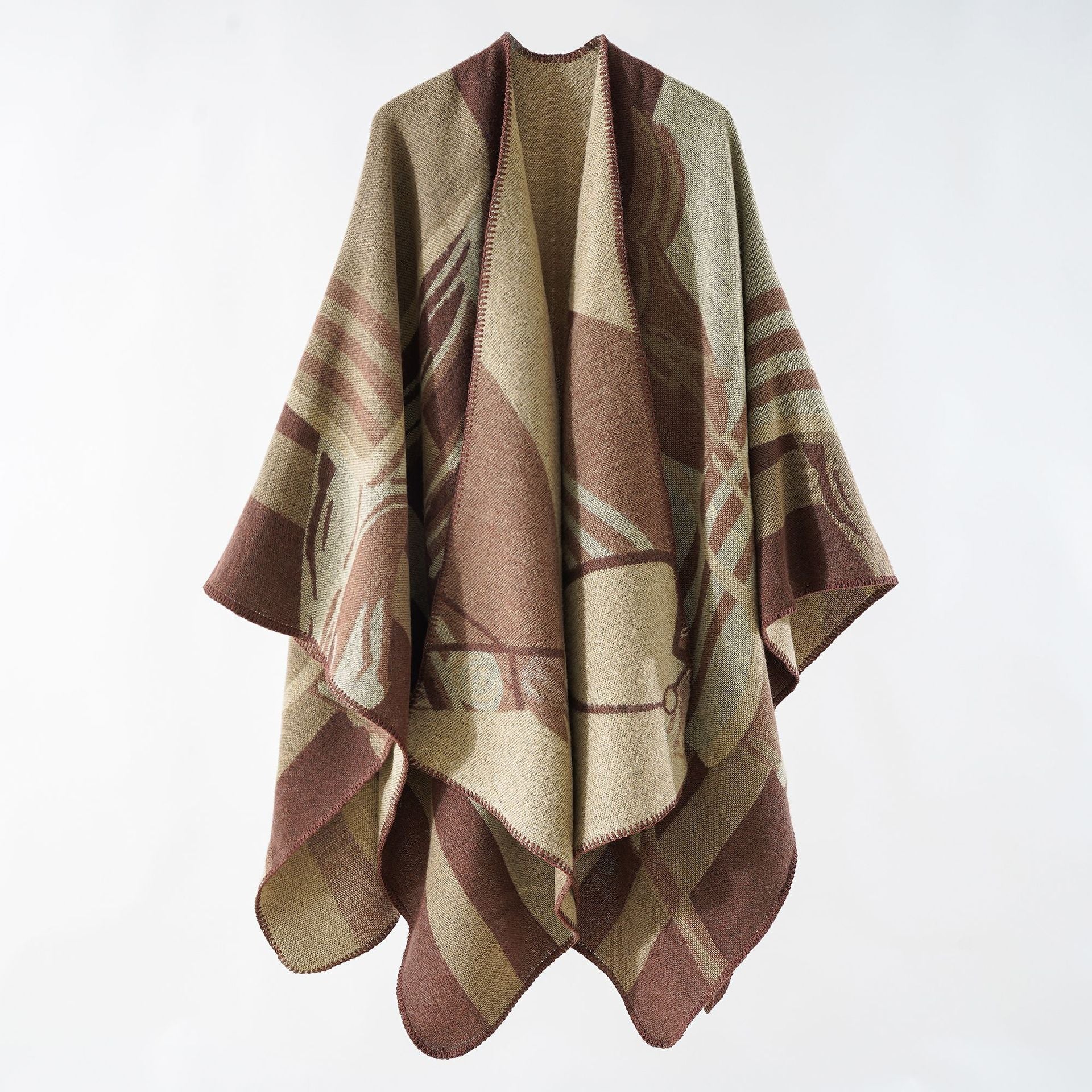 Women's elegant knitted poncho with artistic pattern and fine fringe, size GR