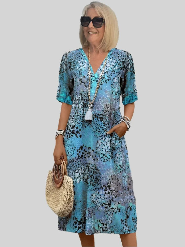 Women's loose summer dress with V-neck and pockets