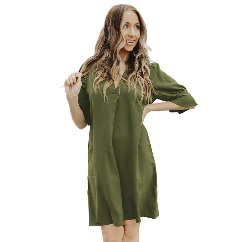 Women's elegant mini dress with a flattering V-neck and puff sleeves, size S
