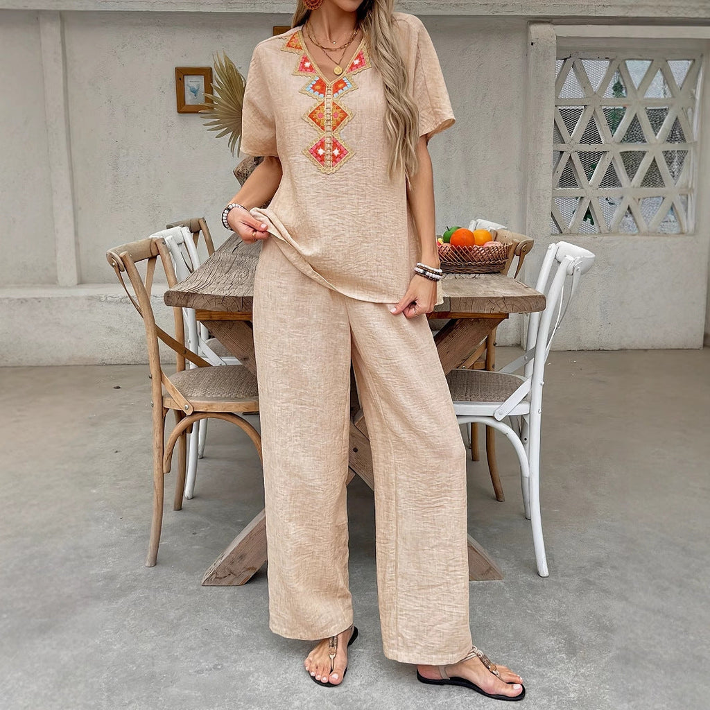 Women's lightweight, airy trouser suit with artistic embroidery, size [size]