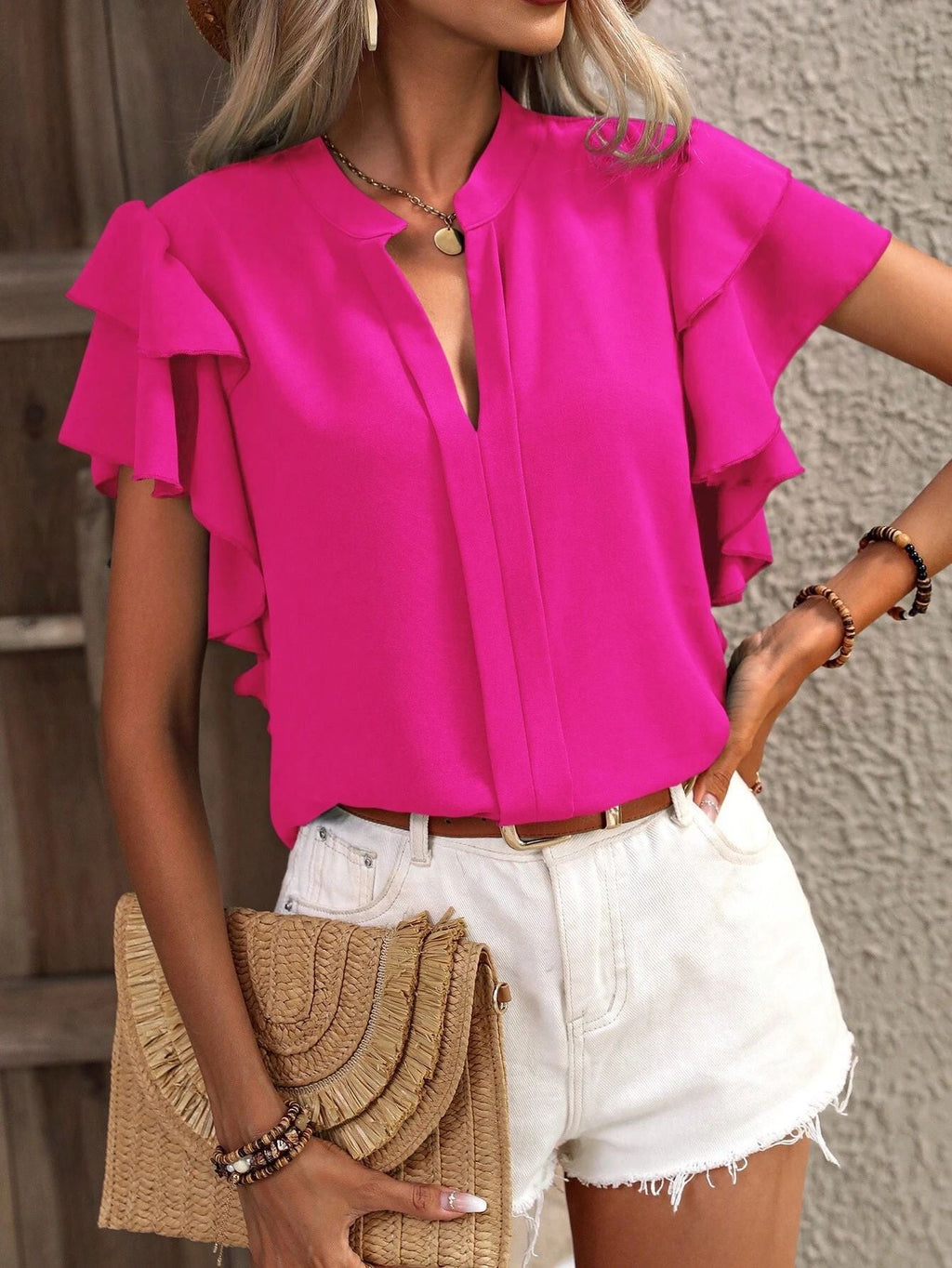 Women's blouse with decorative ruffle details and elegant V-neck, size [size missing]