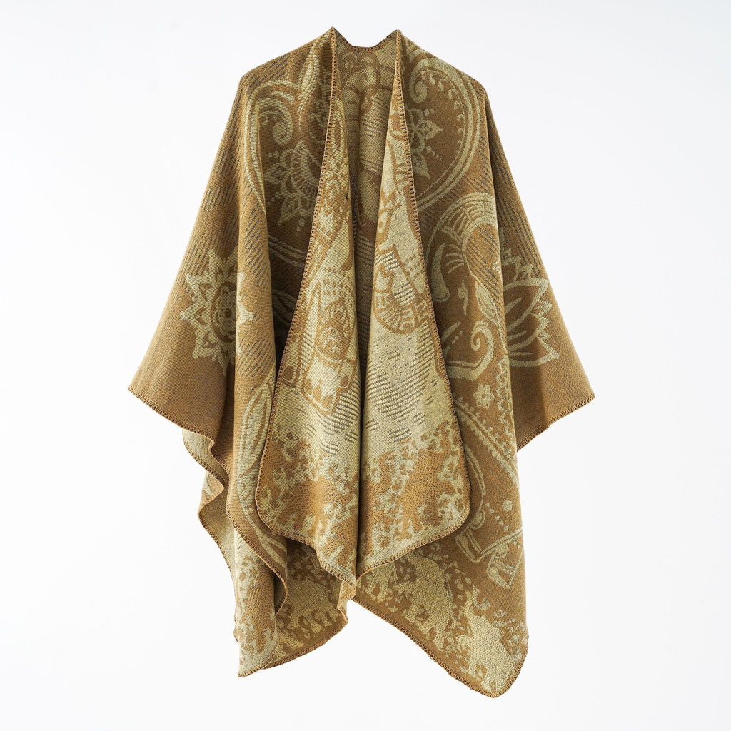 Women's elegant transitional poncho with an artistic floral pattern and fringed edges, size GR