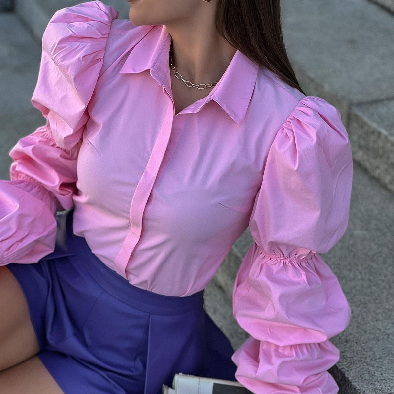Women's blouse with voluminous puff sleeves and elegant cut, size S