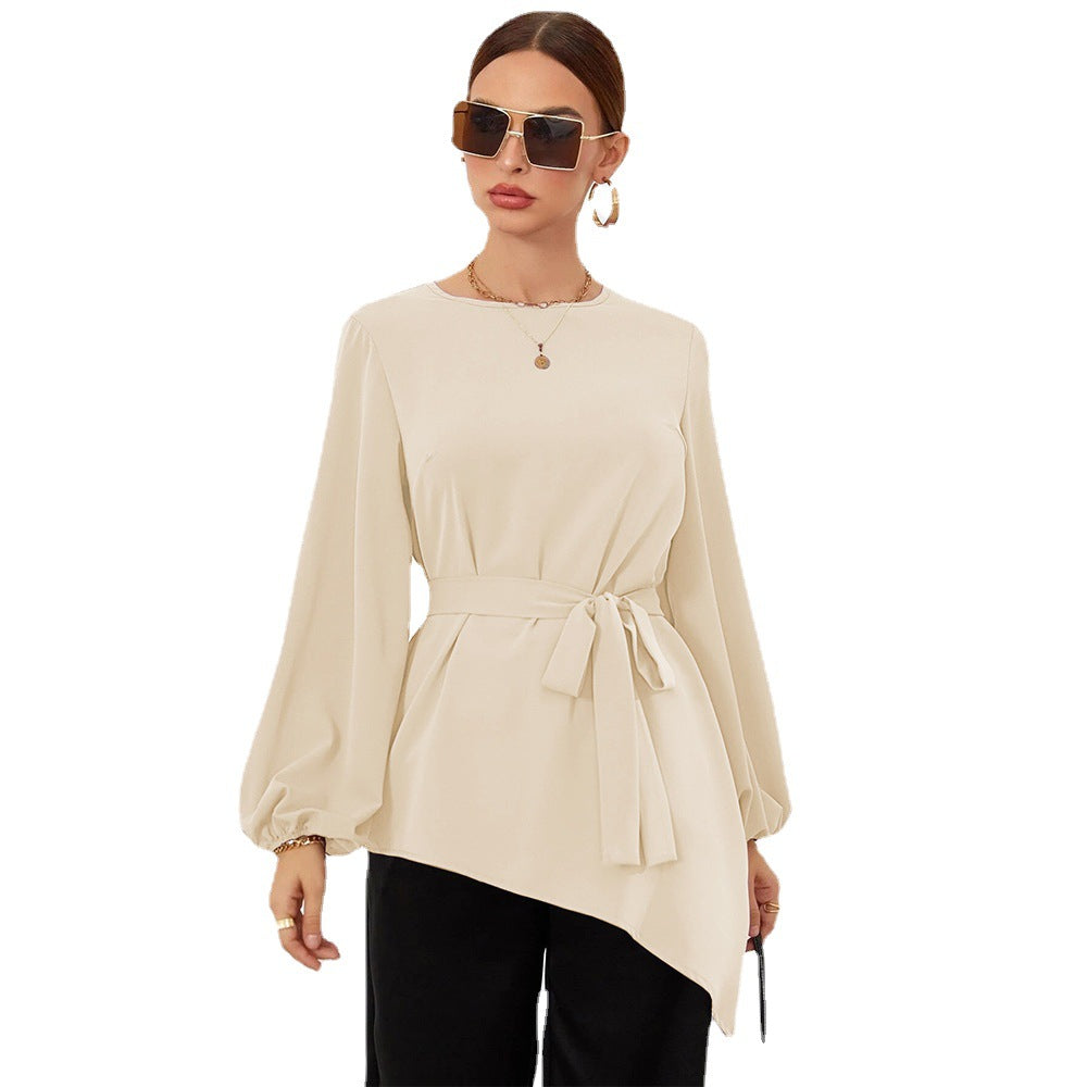 Women's asymmetrical blouse top with elegant ruffles and fashionable waist belt, size S