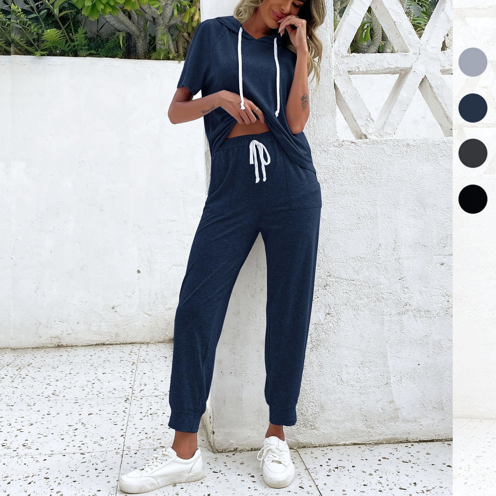 Women's jumpsuit with comfortable drawstring and casual short-sleeved design, size S