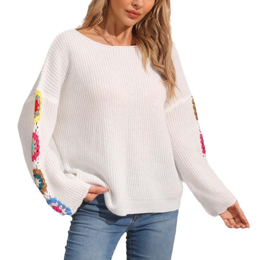 Women's elegant sweater with colorful crochet appliqués on the sleeves, size [size missing]
