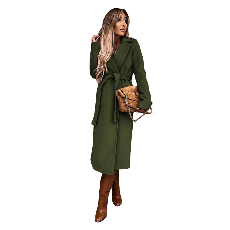 Women's elegant wool coat with tailored cut and belt, size S
