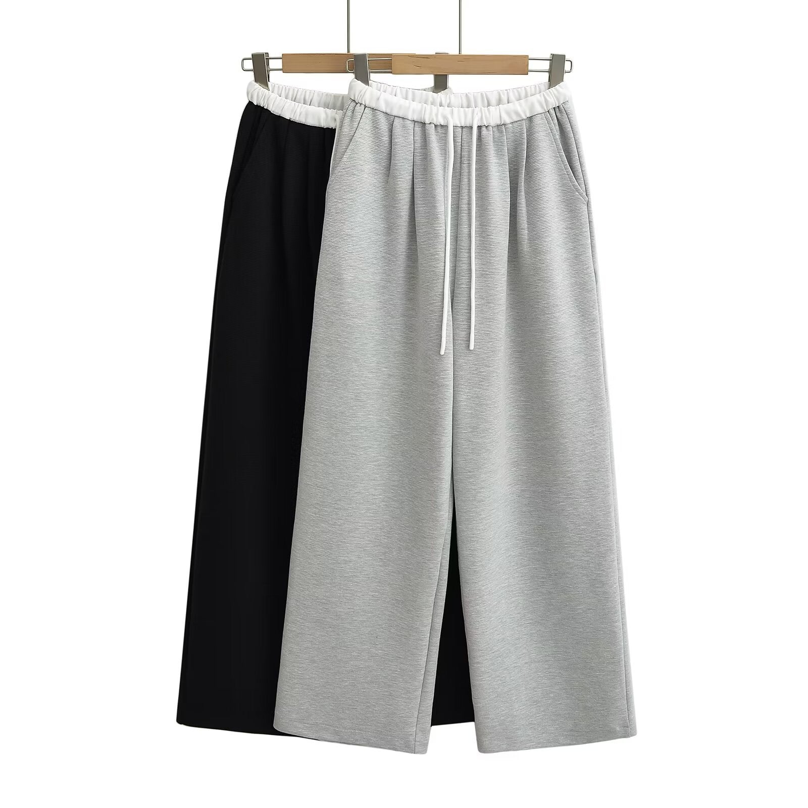 Women's comfortable sweatpants with elastic waistband and side pockets, size