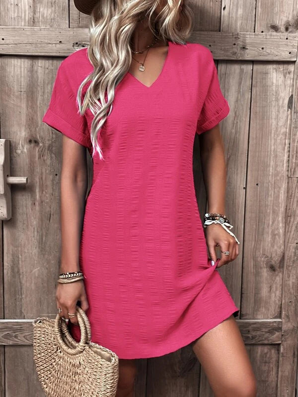 Women's casual V-neck dress with a wide cut