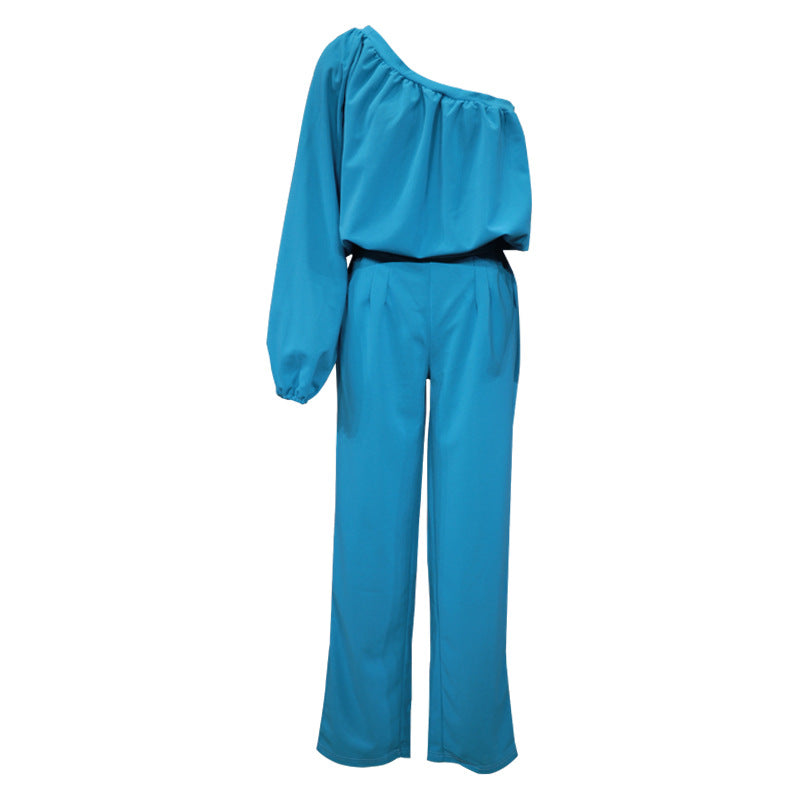 Women's jumpsuit with asymmetrical cut and elegant puff sleeves, size