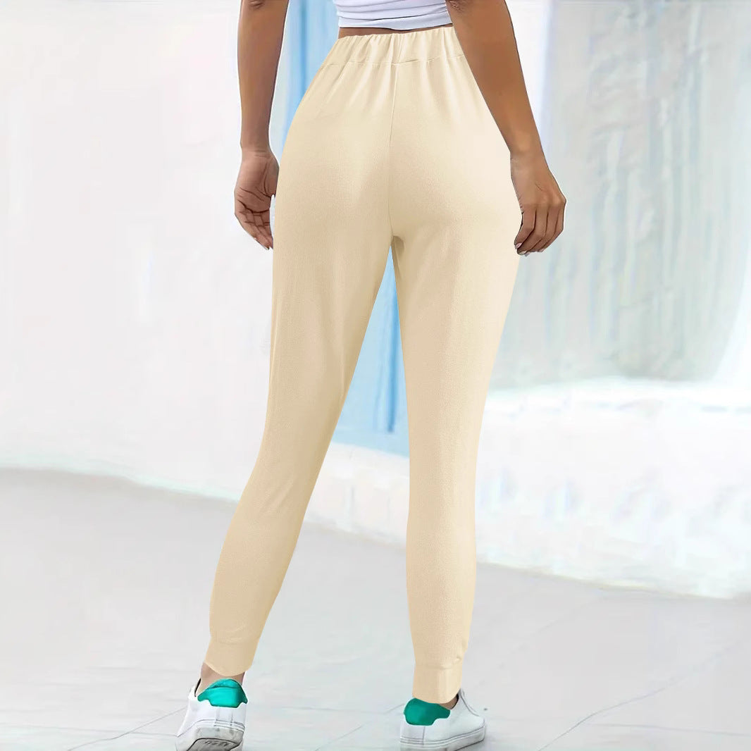 Women's comfortable jogging pants with elastic waistband and practical side pockets, size
