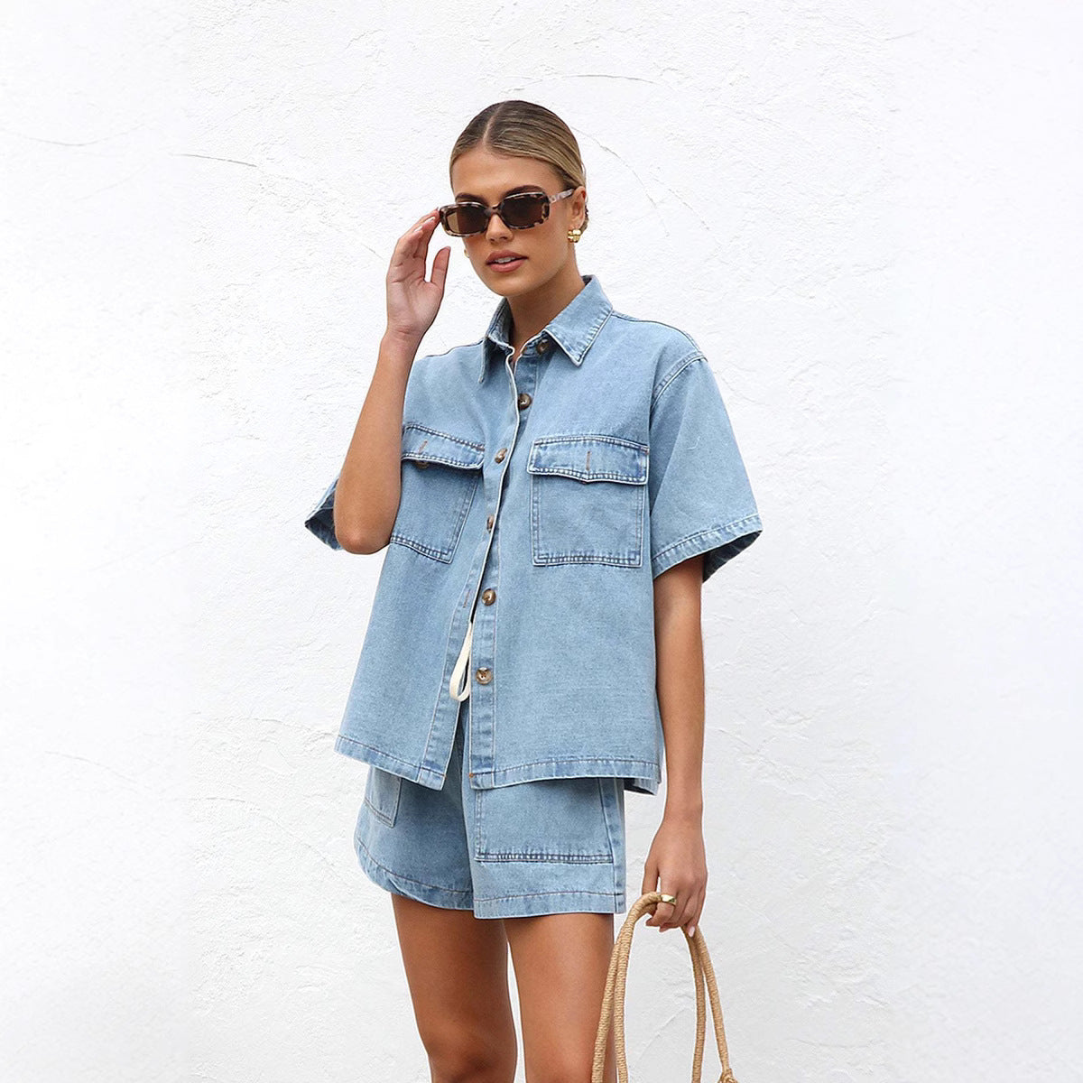 Women's denim crop top and shorts set with practical pockets and a relaxed fit, size S