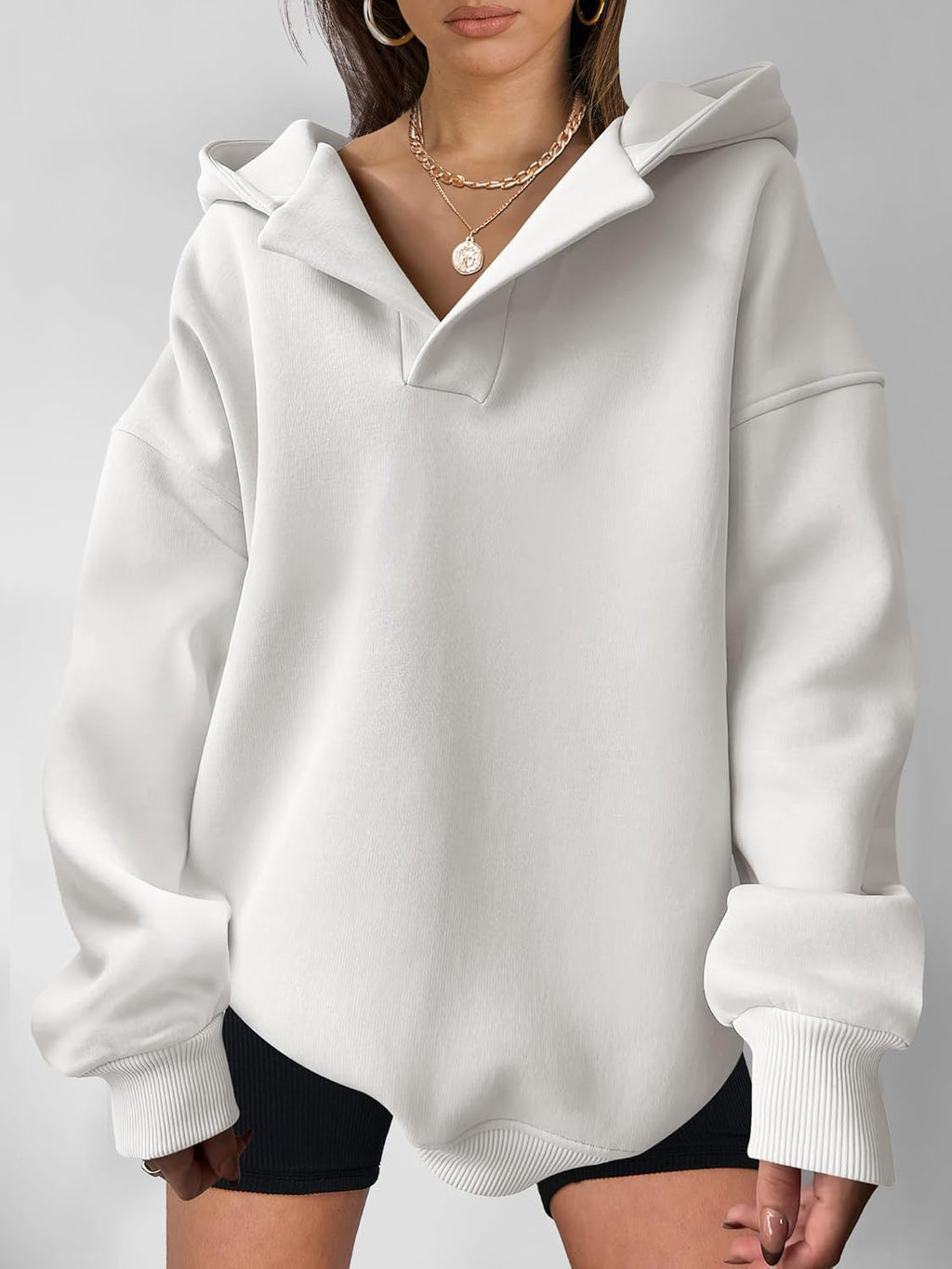 Women's oversized hoodie with a modern collar and relaxed fit, size [size missing]
