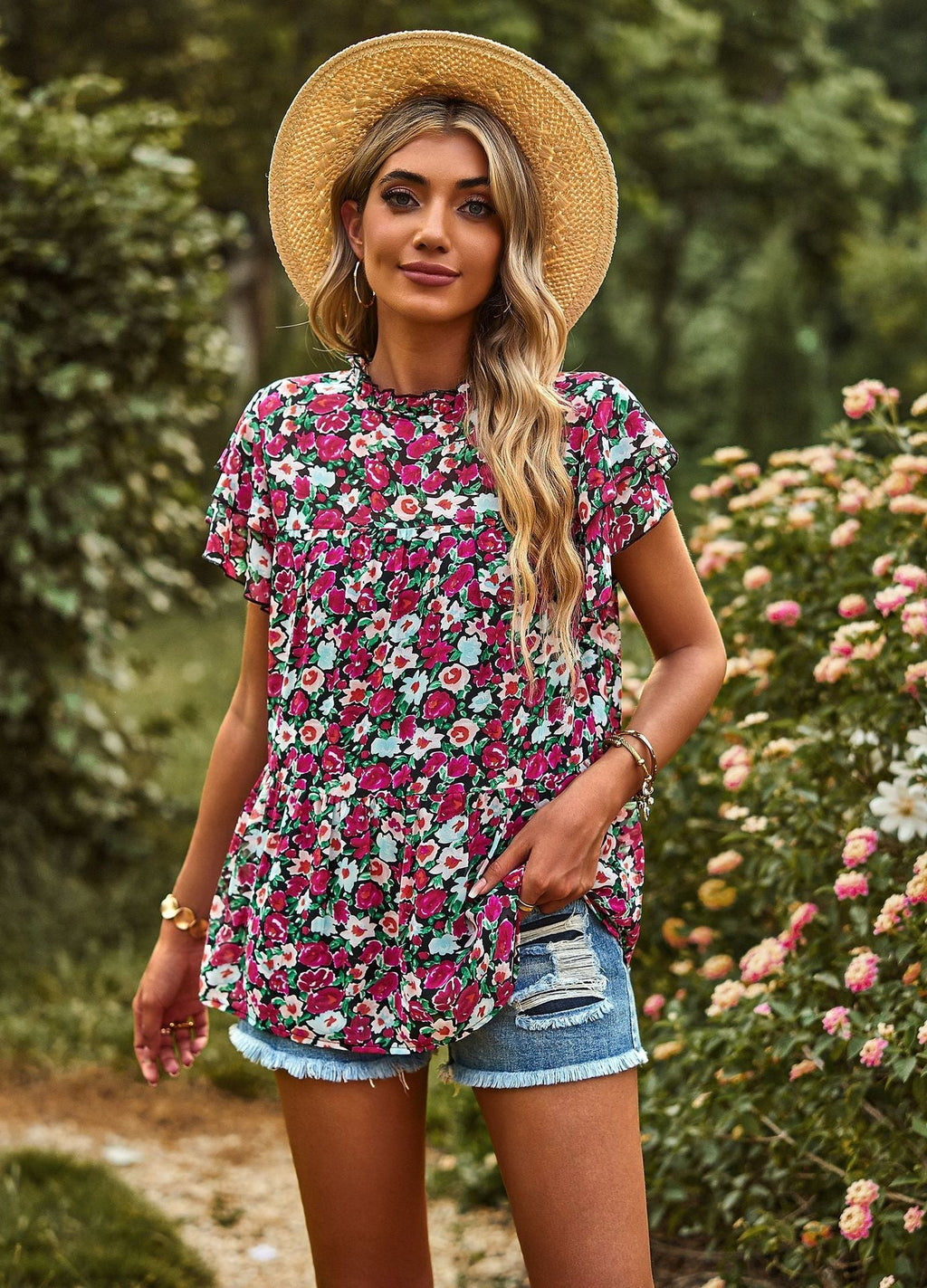 Women's flowy blouse with ruffle details and floral design, size