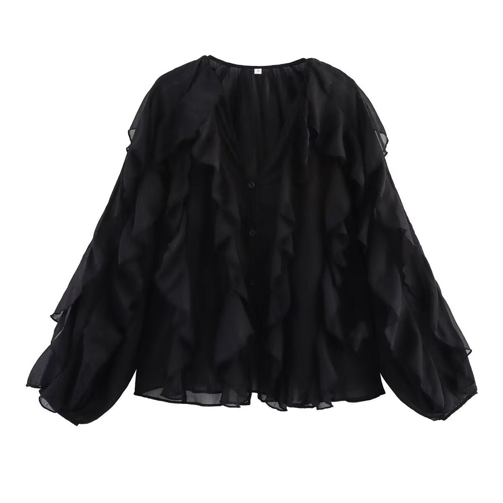 Women's blouse with voluminous ruffle details and elegant cut, size S