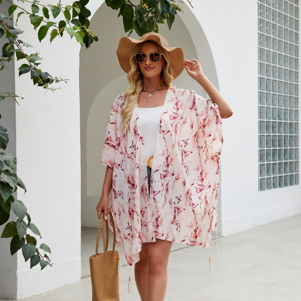 Women's elegant kimono with an artistic floral pattern and fringed edges, size GR