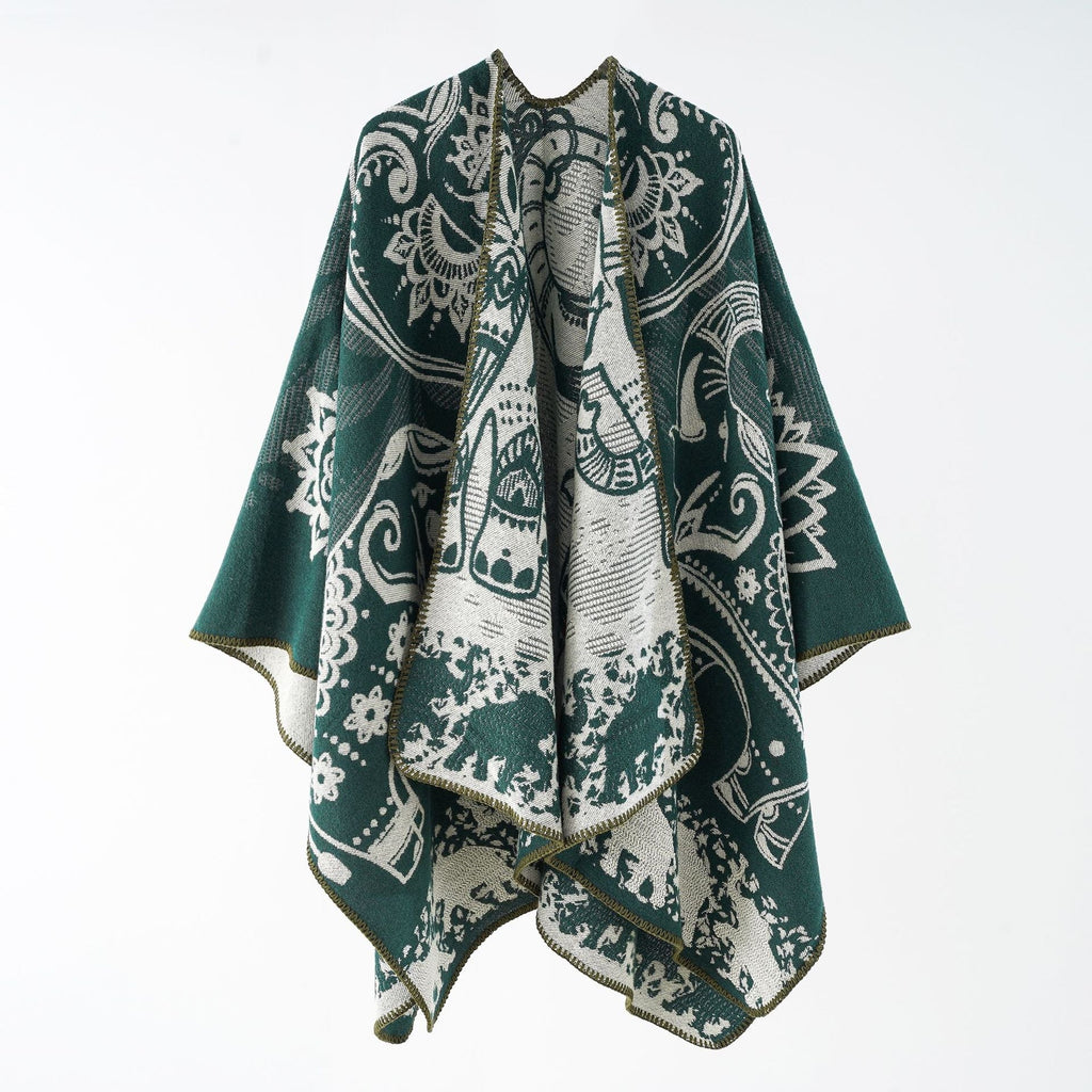 Women's elegant transitional poncho with an artistic floral pattern and fringed edges, size GR