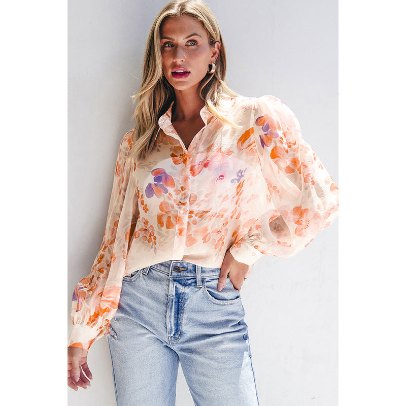 Women's airy blouse shirt with floral design and voluminous sleeves, size S